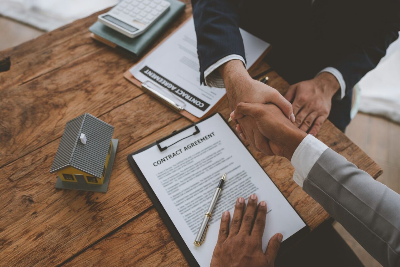 handshake-of-real-estate-brokers-with-customers-or-investors-mortgage-loan-agreements-make-a-lease-.jpg